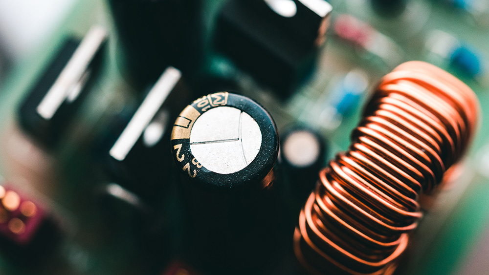 A capacitor acts as a smoothing agent that helps convert a sine wave into a more stable DC voltage by filtering out fluctuations.