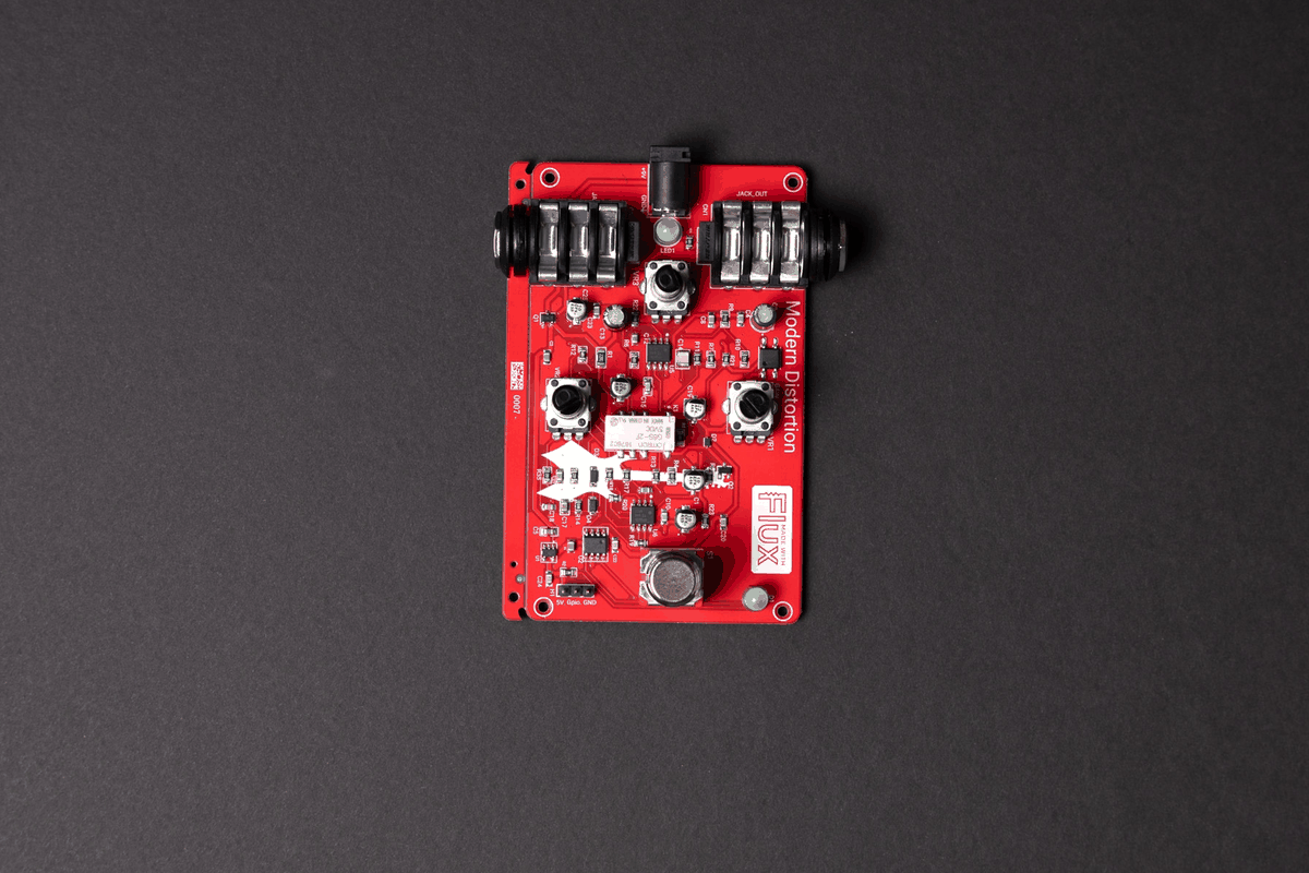 Stop-motion animation of a guitar distortion pedal PCB inside its Flux-generated enclosure